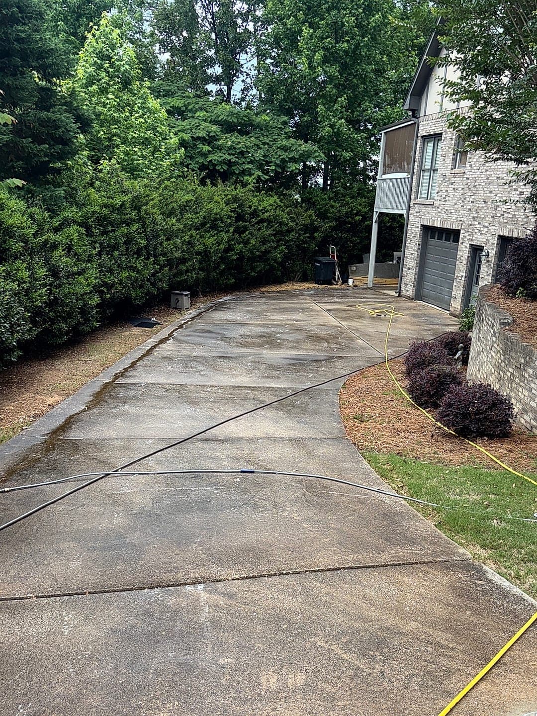 Concrete driveway restoration, before cleaning